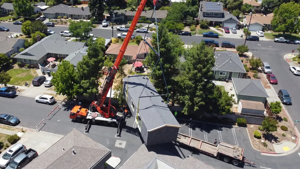 A Framework First home on the crane during delivery